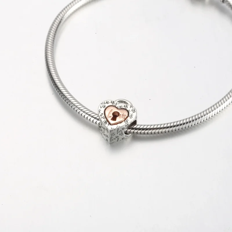 (slika za) PANDORA Dvobarvni ločljivi obesek s srčasto ključavnico - 782505C00 - Ogled 5