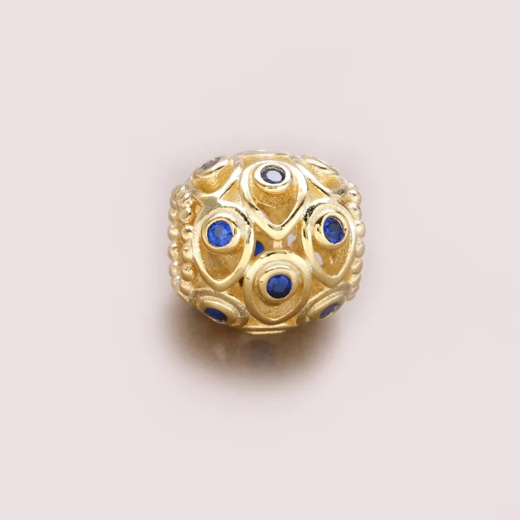 Obesek PANDORA Ocean Treasures, temno modri topaz 14K zlato - 750817TPP